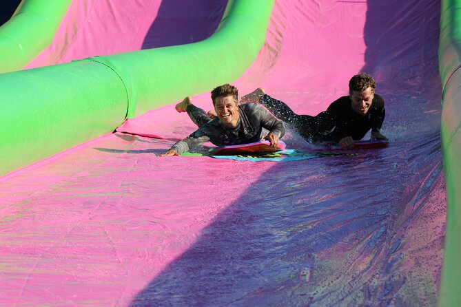 A monster 360ft long slip and slide session in BUDE, Cornwall - Why a 360ft slip-and-slide in Bude is such a hit