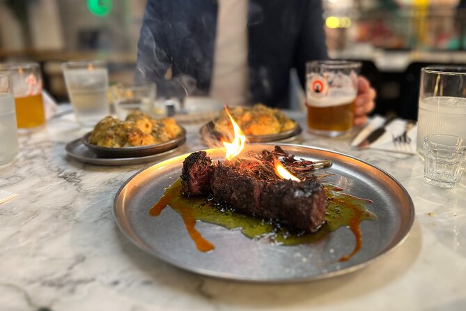 Camden Market Food Tour of 7 Tastings, Gin, Street Food & More - Camden Lock Market East Yard plus Cyberdog: art, fashion, and the Amy Winehouse memorial