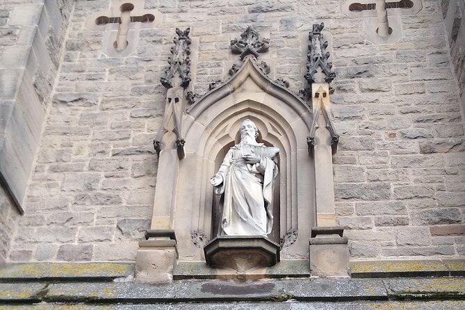 Durham City Walking Tour - The Market Place and Elvet Bridge: trade life plus the quirky side of Durham