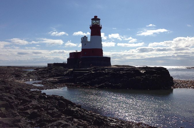 Farne Islands Longstone Lighthouse 2-Hour Trip from Seahouses - Longstone Lighthouse stop: seals, seabirds, and the rescue route