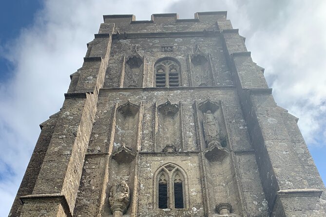 Glastonbury and Cheddar Gorge Guided Day Tour from London - How the guide style shapes the day