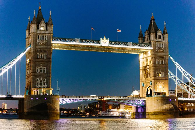Highlights of Royal London Bike Tour with River Cruise Package - Cruising past the Monument and cycling the Tower of London area