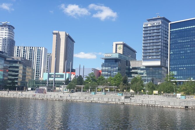 Inspirational guided walking tour of Media City & The Quays - Stop five: Manchester Ship Canal life, from rowing to watersports and fishing