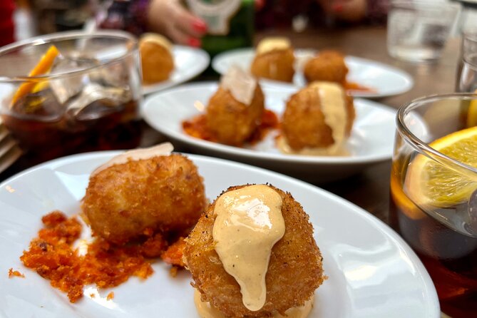 London Soho Food Tour with 7+ Tastings of Delicious Hidden Gems - Stop 3: Great Windmill Street and WWII entertainment history