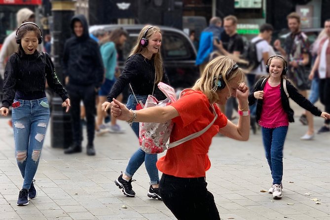 London West End Musical Silent Disco Walking Tour Top 1% Rated - Noel Coward Theatre area, Leicester Square, and Piccadilly lights