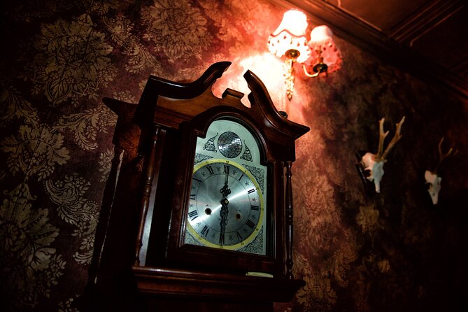 moviESCAPE Stockport Haunted House II Demon's Curse Escape Room - Cinematic atmosphere, practical prep: darkness, torch, and strobe lighting