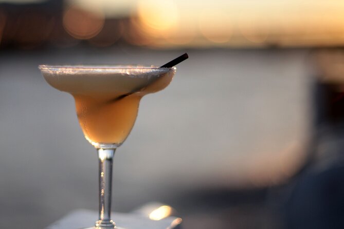 River Thames Evening Cruise with Sparkling wine and Canapés - Canary Wharf and HMS Belfast: old meets new at night
