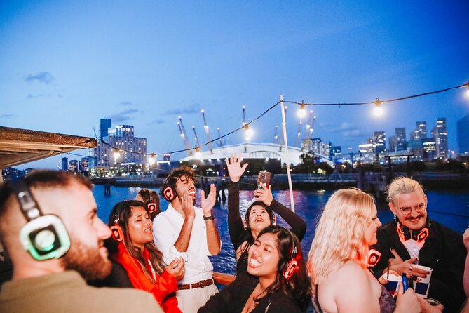 Silent Disco London Thames Boat Party - Canary Wharf lights and the cruise past HMS Belfast